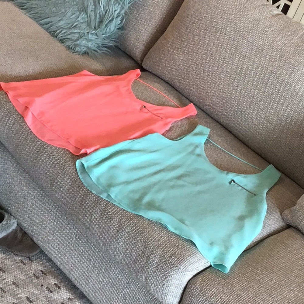 e hanger m Tops, coral and pale green, coral is a medium, green is a large